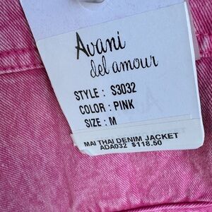 Elevate your style with this stunning Avani del Amour “Mai Thai” denim jacket.